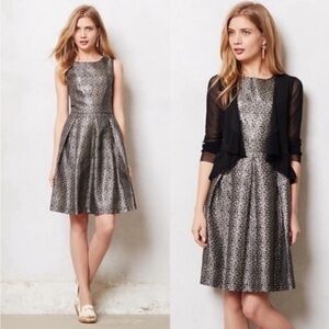 Anthropologie sleeveless black,gold and silver dress with scoop neck siz…